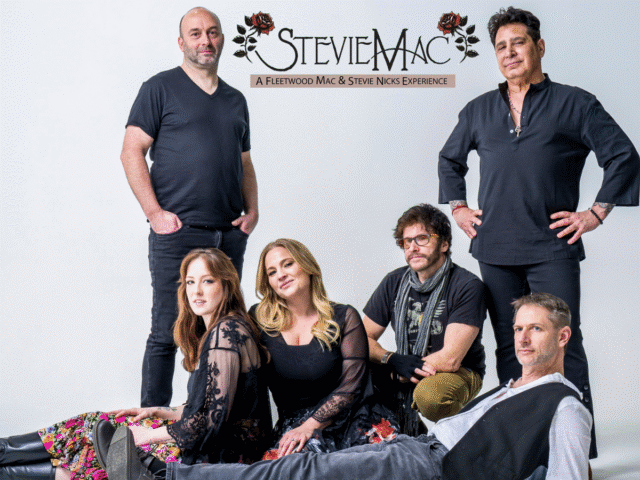 Six-member band posing for a promotional photo, logo StevieMac at top against a light backdrop (Fleetwood Mac & Stevie Nicks tribute).