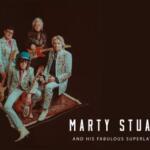 Album cover: Marty Stuart and his Fabulous Superlatives in light-blue suits with guitars on a dark background; title text reads 'Marty Stuart and His Fabulous Superlatives' at the bottom.